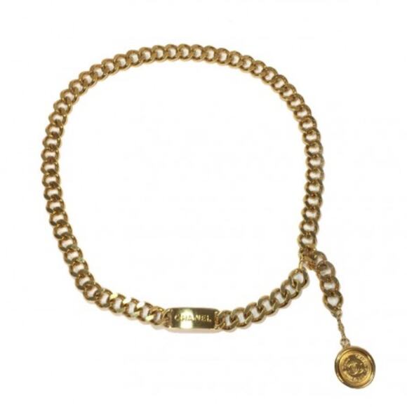 90’s. Vintage CHANEL thick chain belt with golden mademoiselle and CC charm. main image 9